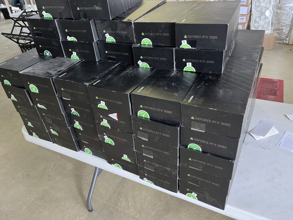 Another successful GPU sale: GPUs on a folding table.